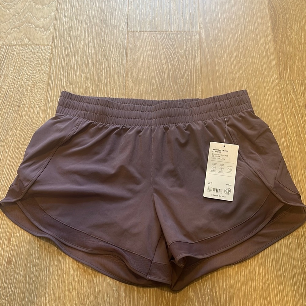 ATHLETA mesh racer run 4” short